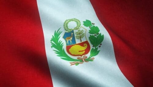 A closeup shot of the waving flag of Peru with interesting textures